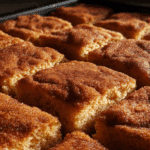 Chewy Snickerdoodle Cookie Bars fresh from oven with golden cinnamon-sugar topping