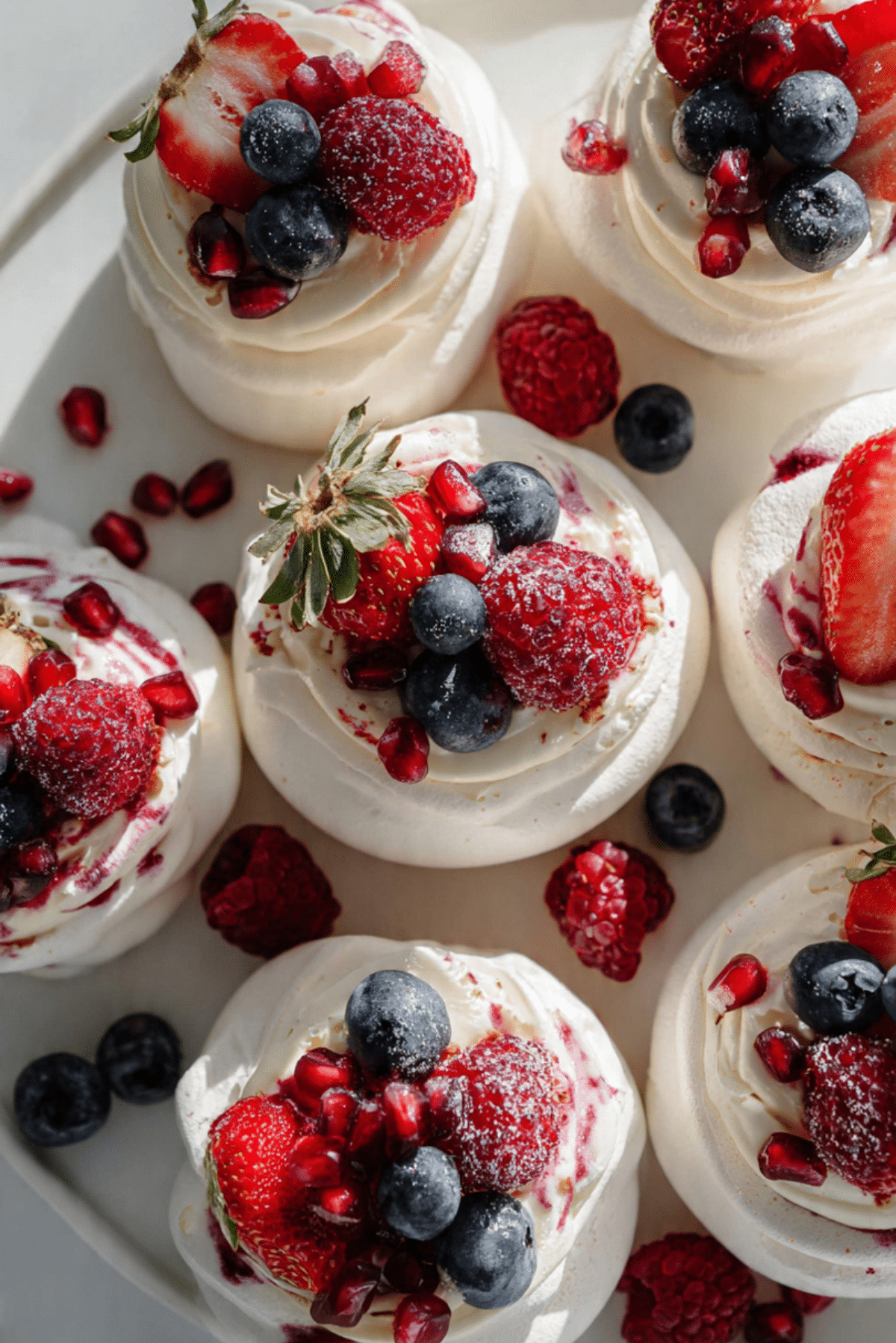 Mini Berry Ripple Cheesecake Pavlovas