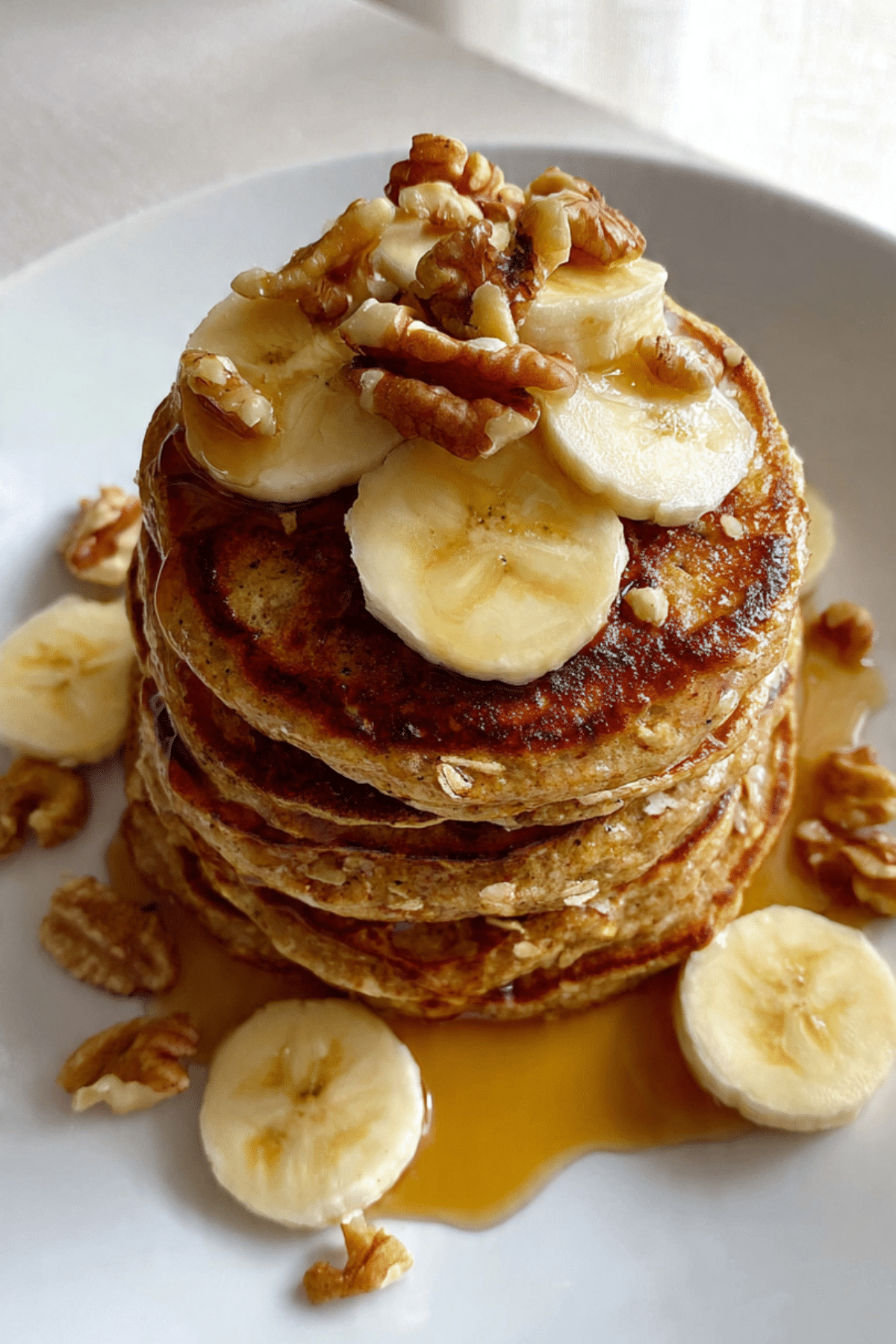 Banana Oat Pancakes with Walnuts