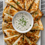 Chipotle Black Bean Quesadillas with Cumin and Chive Dipping Sauce