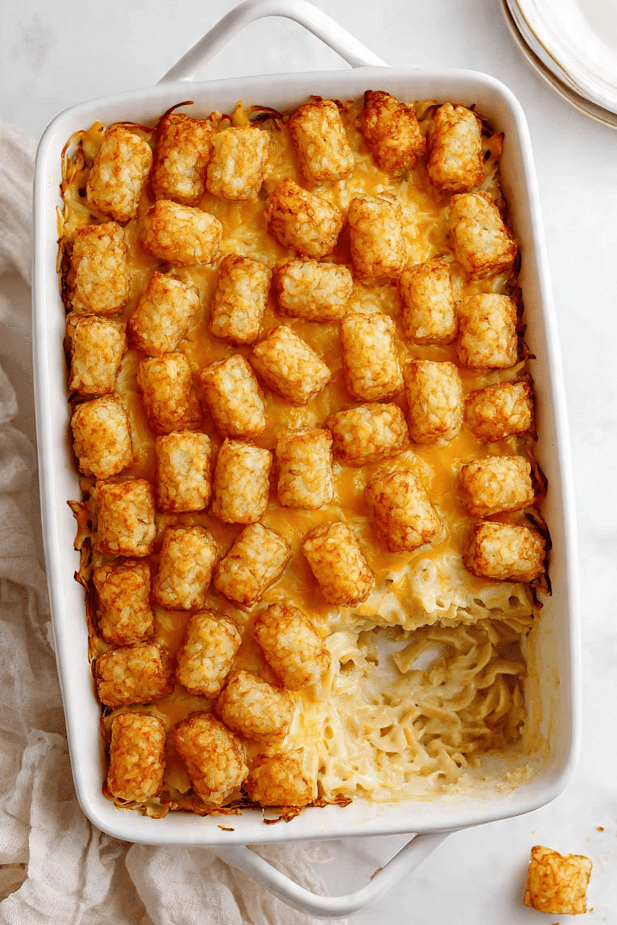 Cheesy Ground Chicken Noodle Casserole with Tater Tot Crust