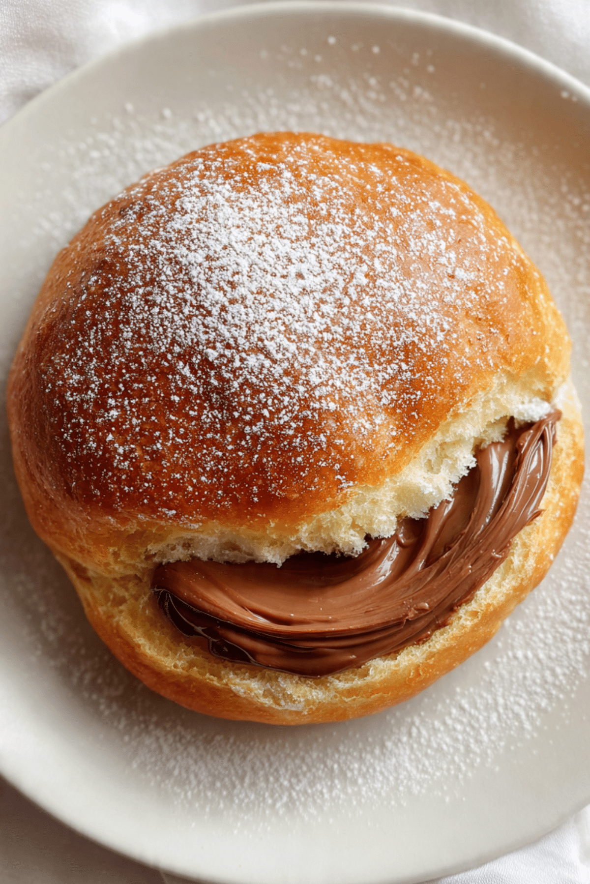 fluffy brioche filled with warm Nutella