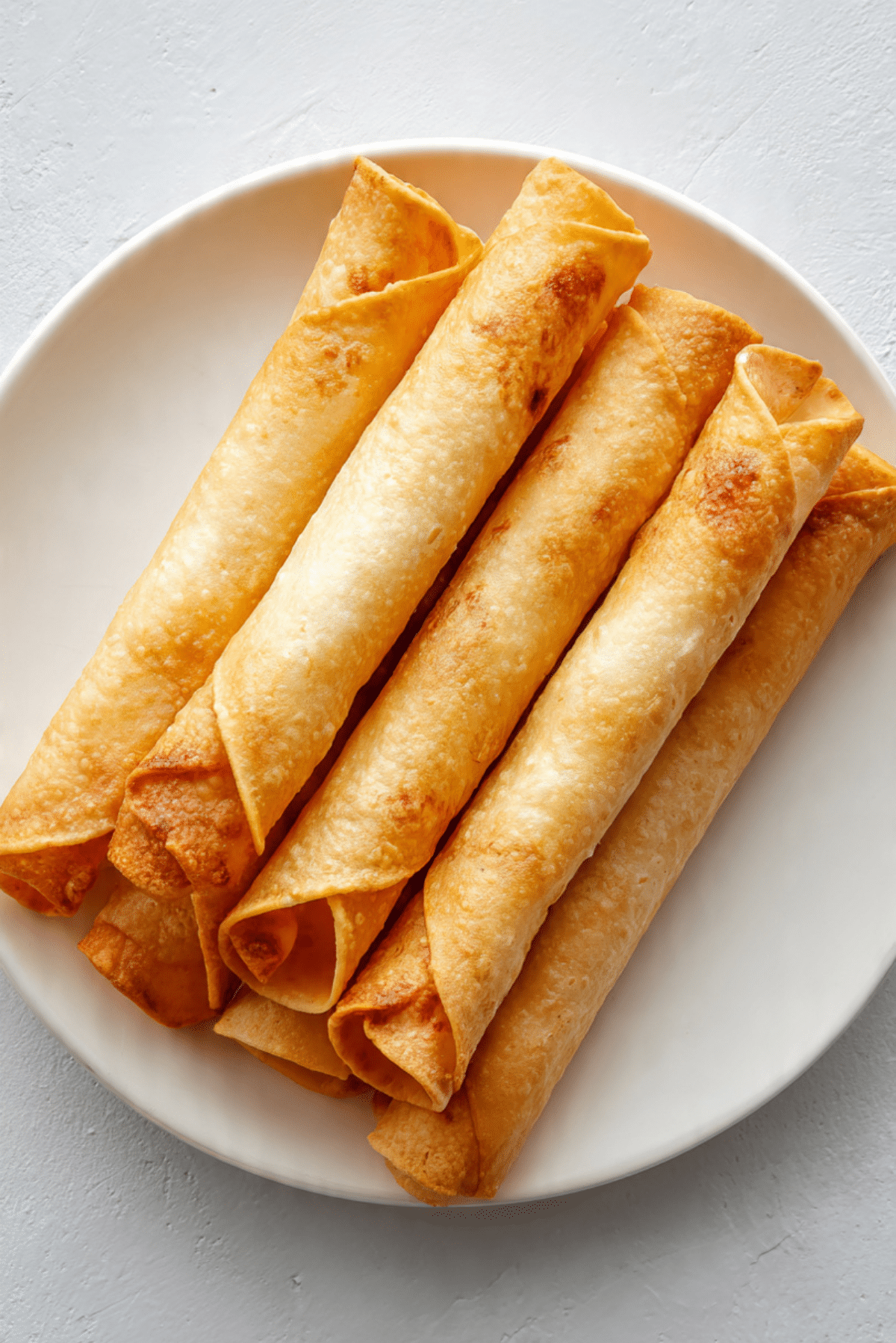 Chicken and cheese taquitos
